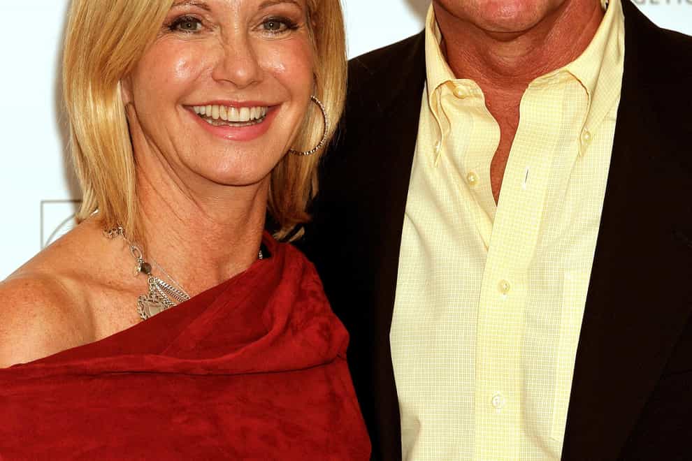 Dame Olivia Newton-John’s husband: Our love transcends our understanding (PA)