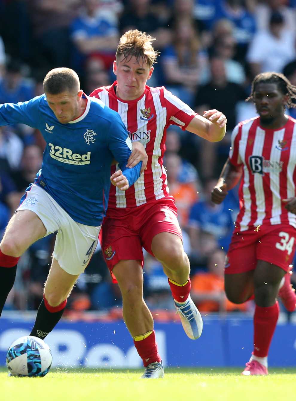 Rangers’ John Lundstram (left) is looking forward to the Champions League play-off tie against PSV (Robert Perry/PA)