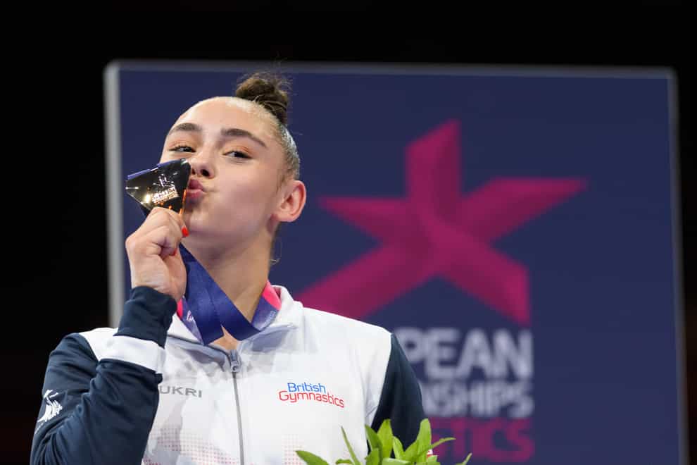 Great Britain’s Jessica Gadirova celebrates with the gold medal after winning the women’s floor exercise in the European Championships in Munich (Sven Beyrich/DPA)