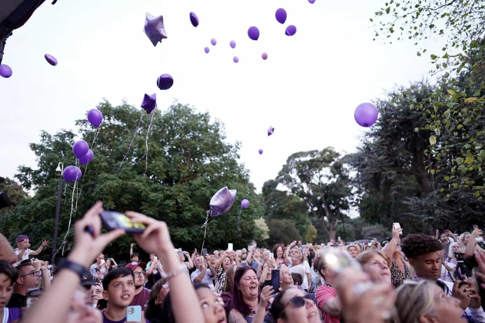 People release purple balloons at Priory Park in Southend (Stefan Rousseau/PA)