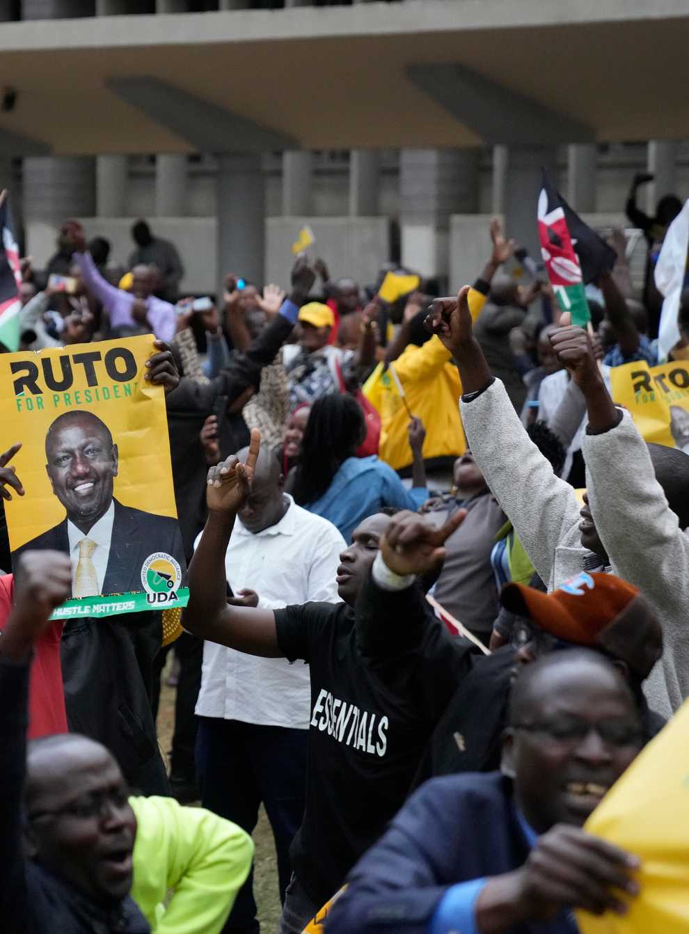 Supporters of Kenyan deputy president William Ruto celebrate (Mosa’ab Elshamy/AP)