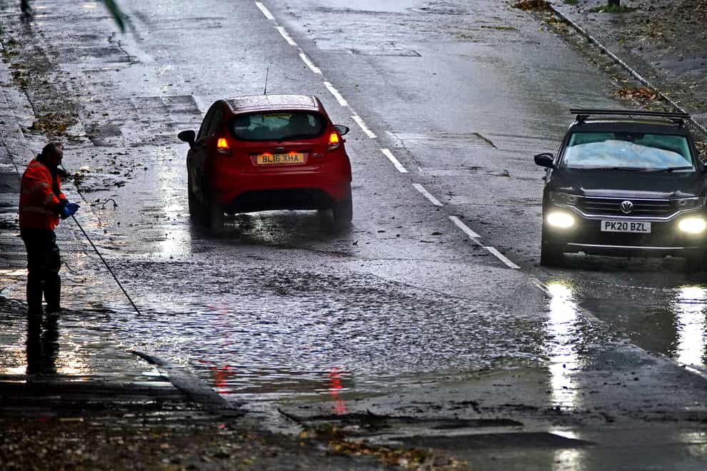 Motorists have been warned of the dangers of driving through flood water (Peter Byrne/PA)