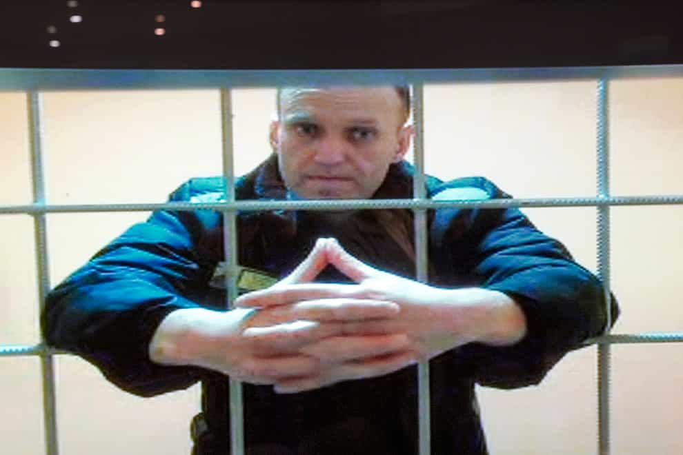 Alexei Navalny appears on a video screen set up at Moscow City Court, in May (Russian Federal Penitentiary Service/AP)