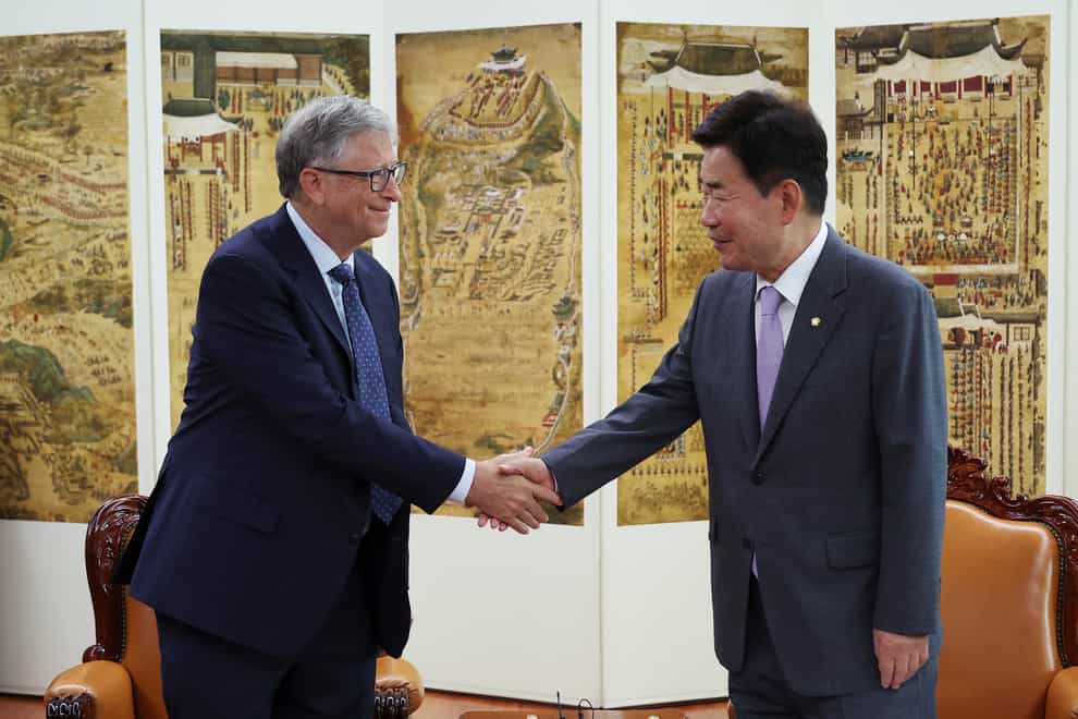 Microsoft Corp co-founder Bill Gates shakes hands with South Korea’s National Assembly Speaker Kim Jin-pyo during their meeting at the National Assembly in Seoul, South Korea, Tuesday, Aug. 16, 2022 (Kim Hong-ji/AP/PA)