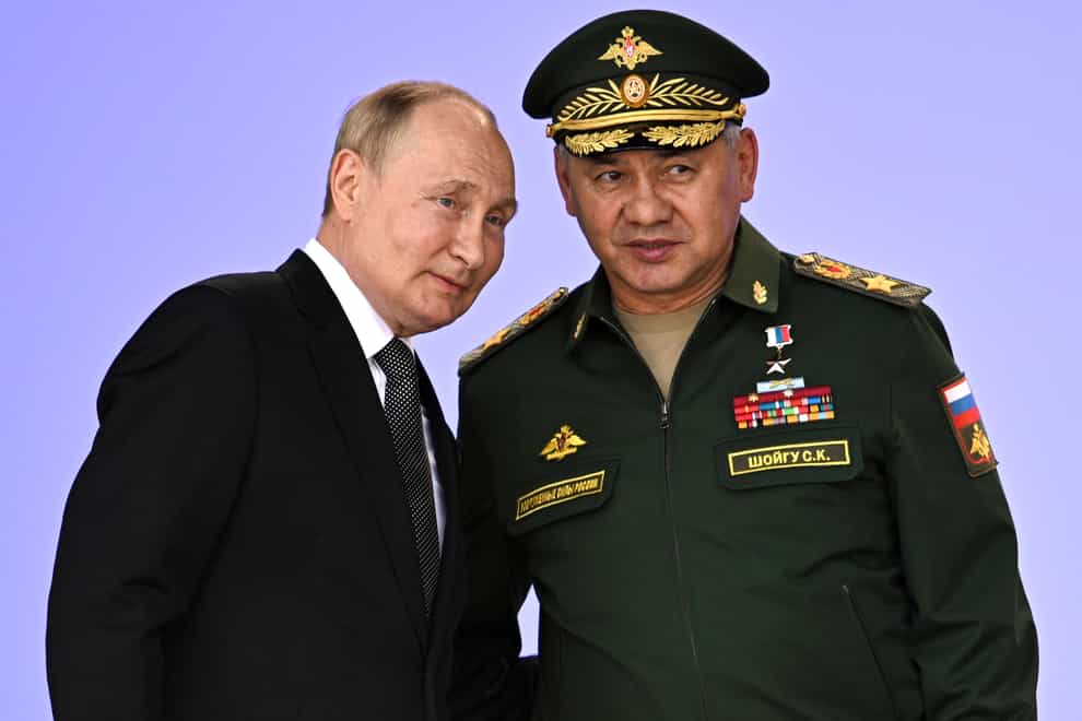 Vladimir Putin and defence minister Sergei Shoigu (Sputnik, Kremlin Pool/AP)