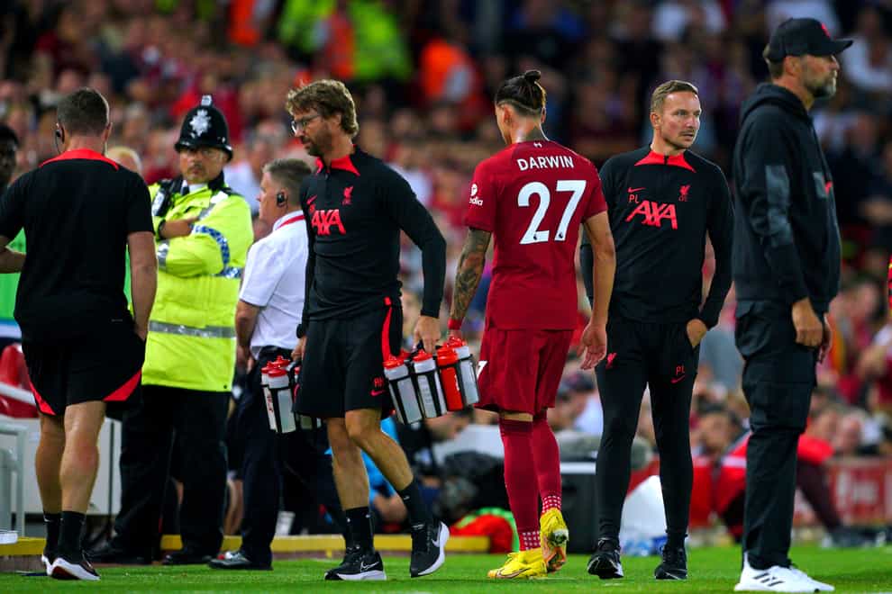 Liverpool’s Darwin Nunez (centre right) leaves the pitch after receiving a red card against Palace (Peter Byrne/PA)