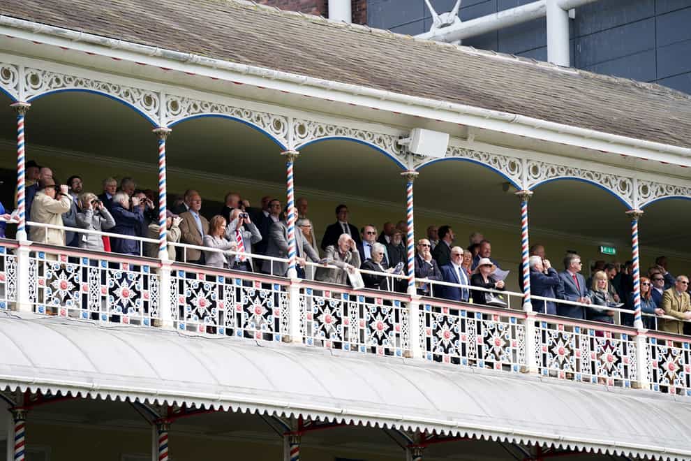 Racegoers in the stands watching the Churchill Tyres Handicap during day one of the Dante Festival 2022 at York racecourse (Tim Goode/PA)