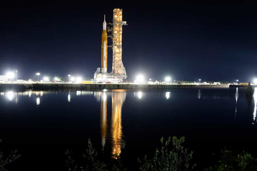 The Artemis rocket moves slowly to pad 39B at the Kennedy Space Centre (Terry Renna/AP)