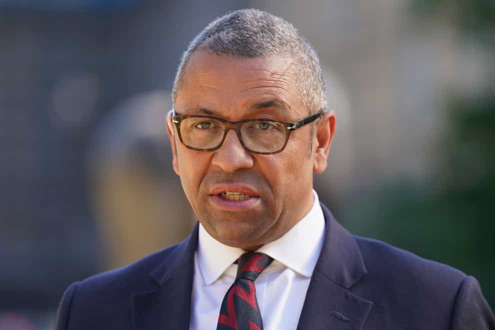 James Cleverly, the Education Secretary, giving media interview on College Green, outside the Houses of Parliament (Kirsty O’Connor/PA)