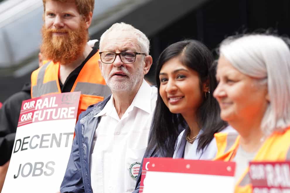 Jeremy Corbyn, second left, and Zarah Sultana, MP for Coventry South, second right, on the picket line outside London Euston train station (Stefan Rousseau/PA)