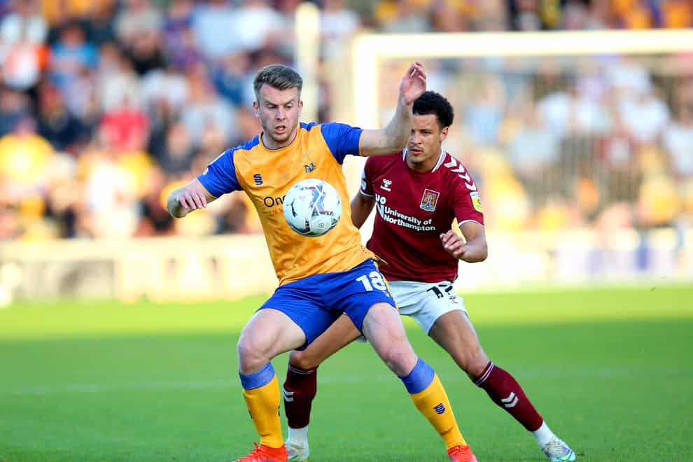 Mansfield’s Rhys Oates (left) sustained an injury against AFC Wimbledon on Tuesday (Nigel French/PA).