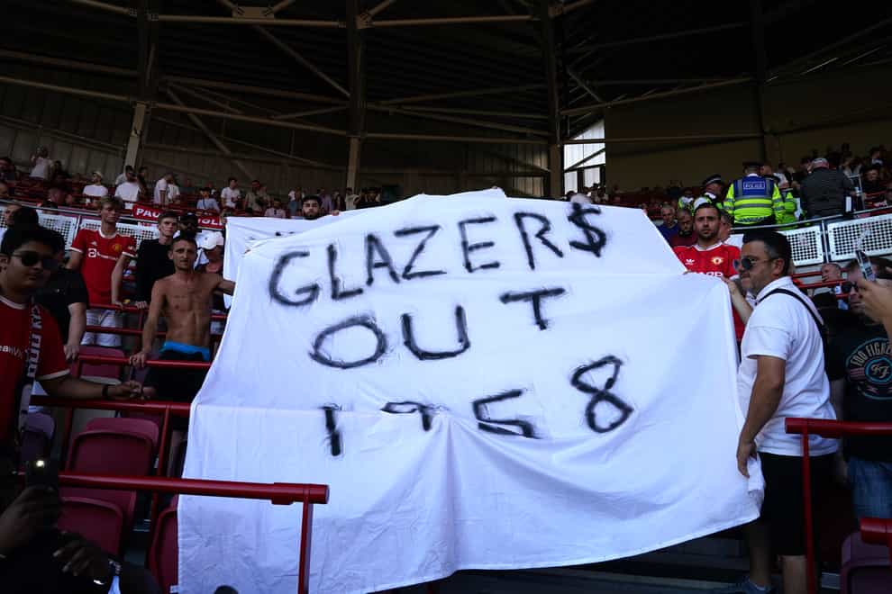 Manchester United fans protest against the Glazer family’s ownership at Brentford (John Walton/PA)