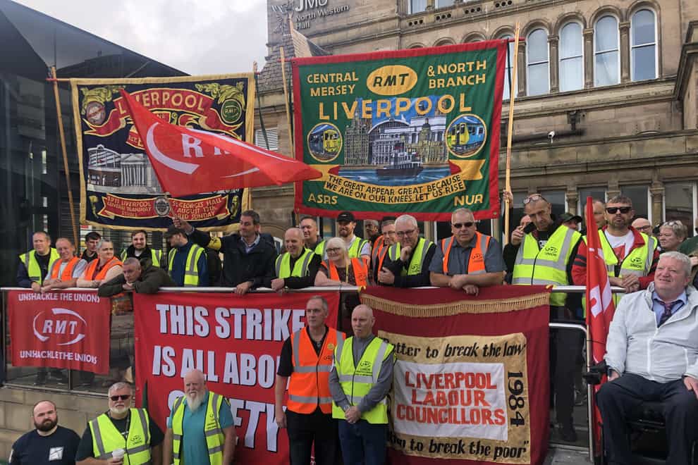 The picket line outside Liverpool Lime Street station (PA)