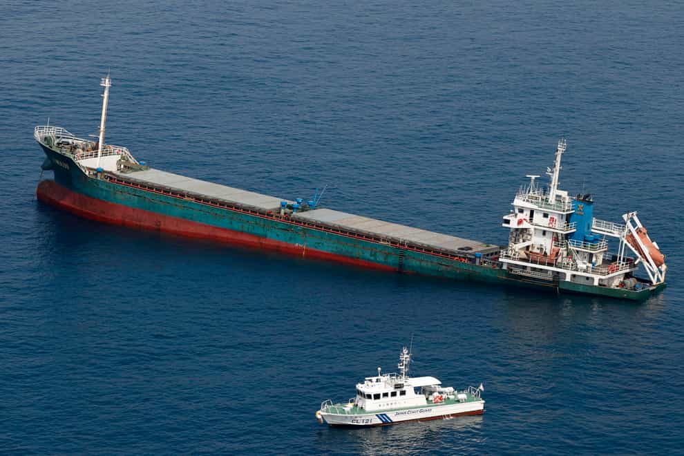 This Xin Hai 99 initially began to sink following the incident (Kyodo News/AP)