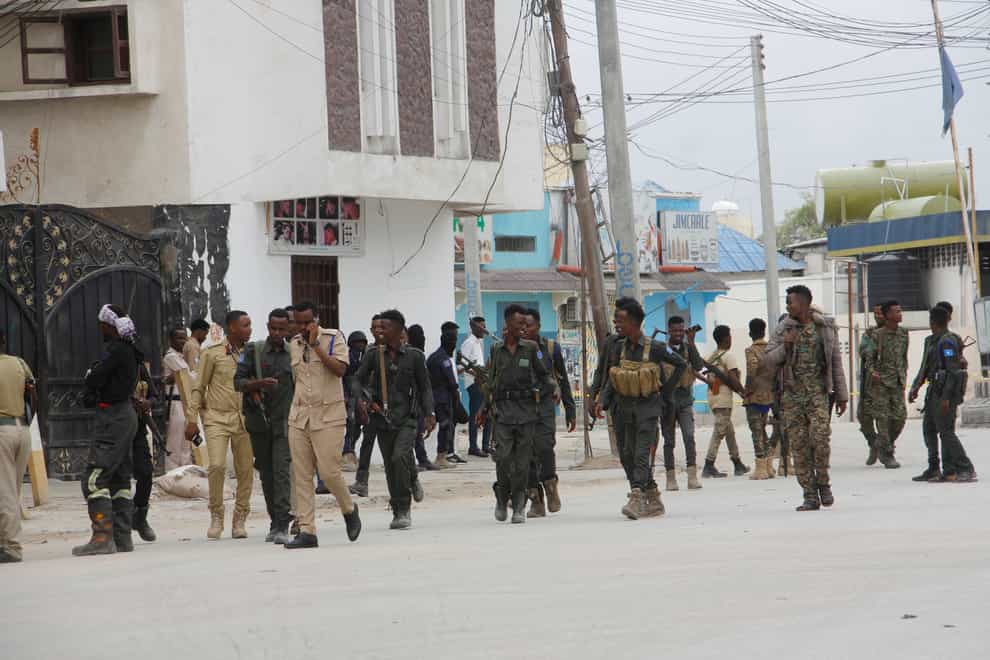 Soldiers patrol outside the Hayat Hotel in Mogadishu (Farah Abdi Warsameh/AP)