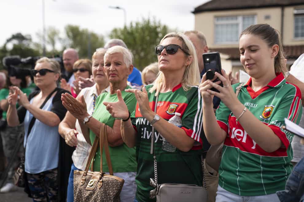 Members of the Irish community gather on Cayton Road in Greenford (Kirsty O’Connor/PA)