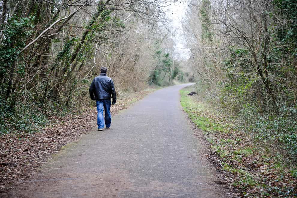 A general view of a man walking on the Bristol & Bath railway path (Ben Birchall/PA)