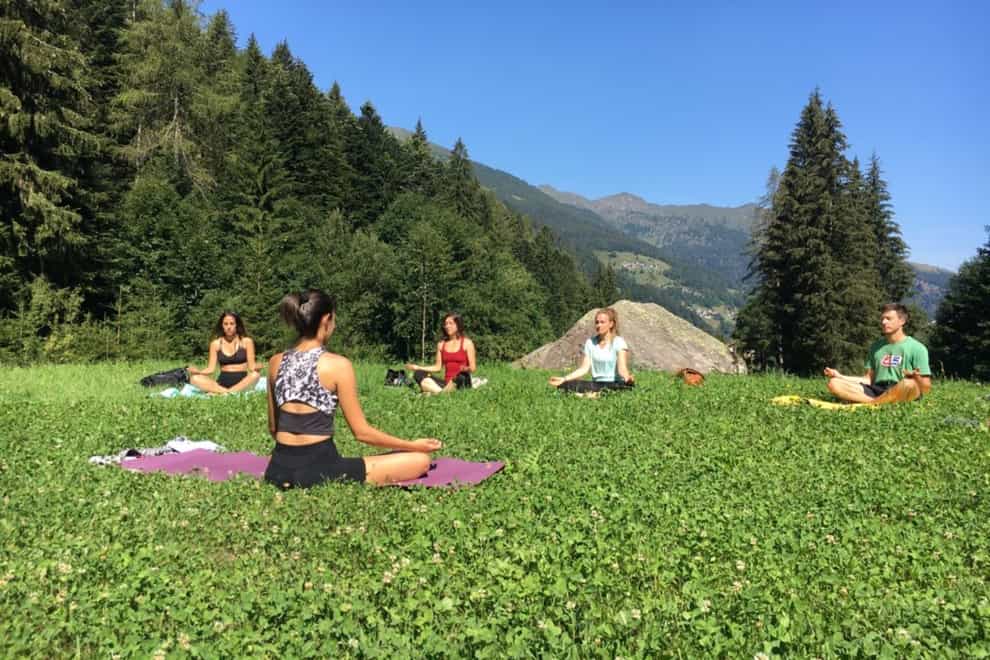 Yoga in the Italian Alps (Michelle Valtellina/PA)