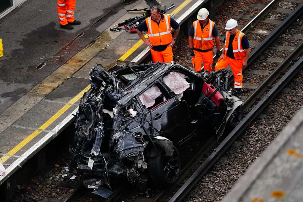 The scene of a fatal crash in Park Royal, west London, in which a Range Rover ended up on a railway track (Victoria Jones/PA)