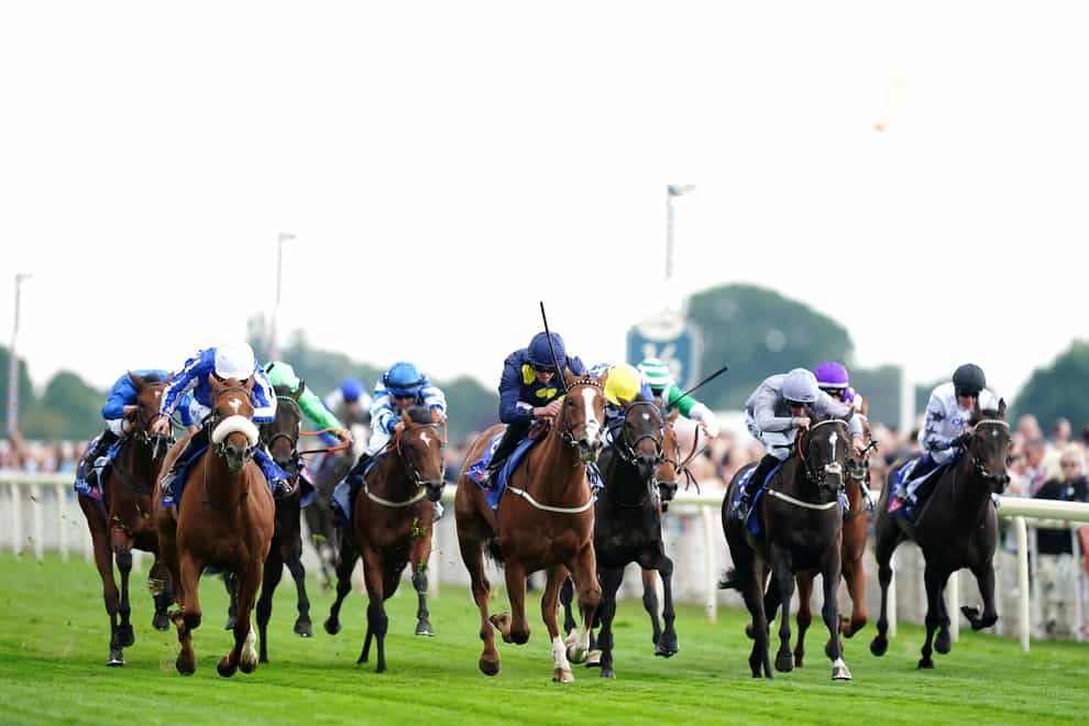 Swingalong (centre) could bypass another clash with Queen Me (left, noseband) (Mike Egerton/PA)