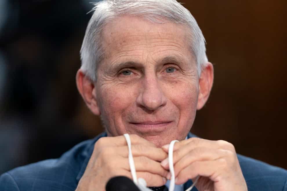 Dr Anthony Fauci will leave his job in December (Jacquelyn Martin/AP)