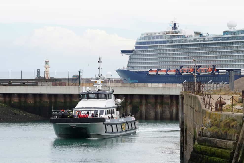 A Border Force vessel carrying a group of people thought to be migrants arrives in Dover, Kent, following a small boat incident in the Channel. Picture date: Monday August 22, 2022. (Gareth Fuller/PA)