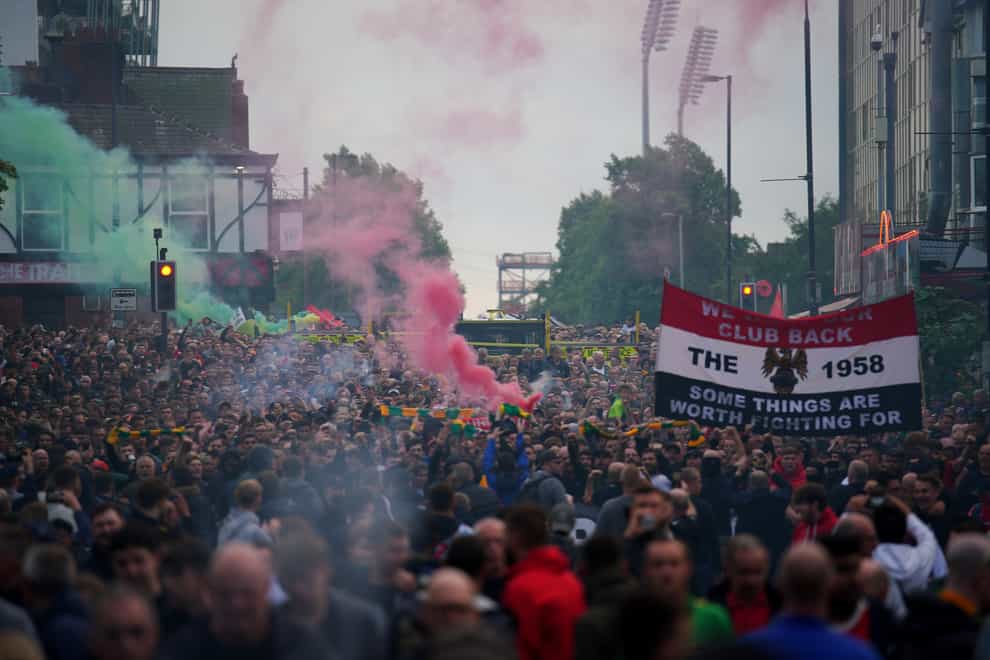 Fans gathered in large numbers ahead of Manchester United’s clash with Liverpool on Monday (Peter Byrne/PA)
