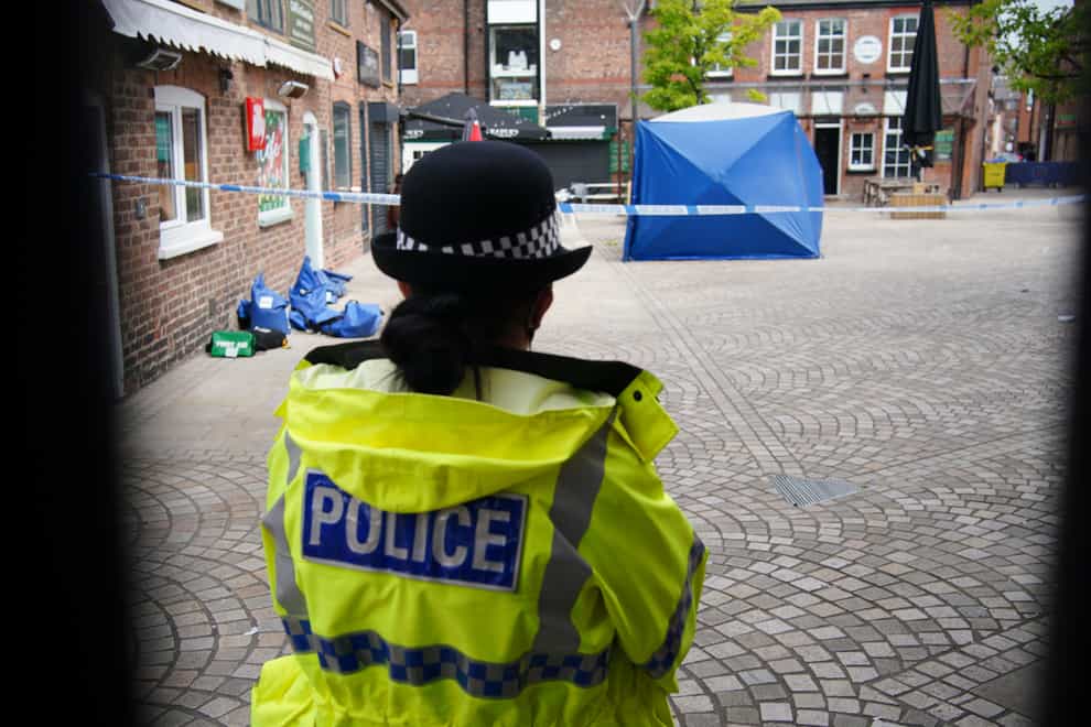 A police tent at the scene on Railway Street in Altrincham (Peter Byrne/PA)
