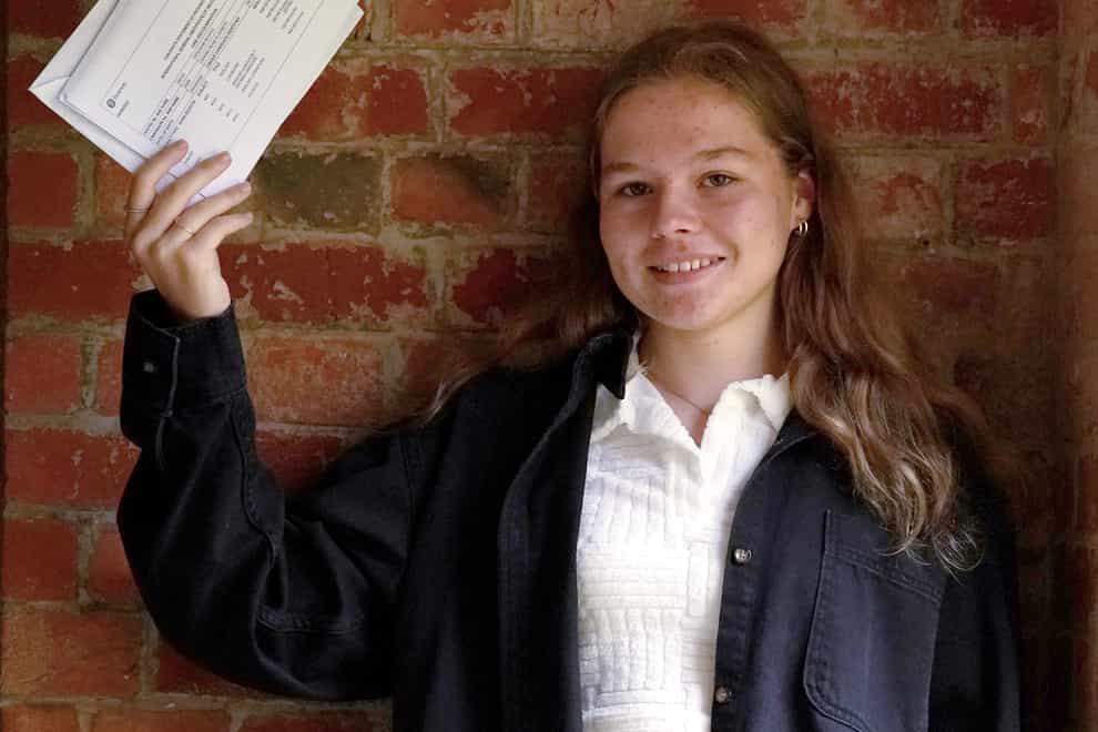 Rose Owens with her GCSE results at Roedean School in Brighton, East Sussex (Gareth Fuller/PA)