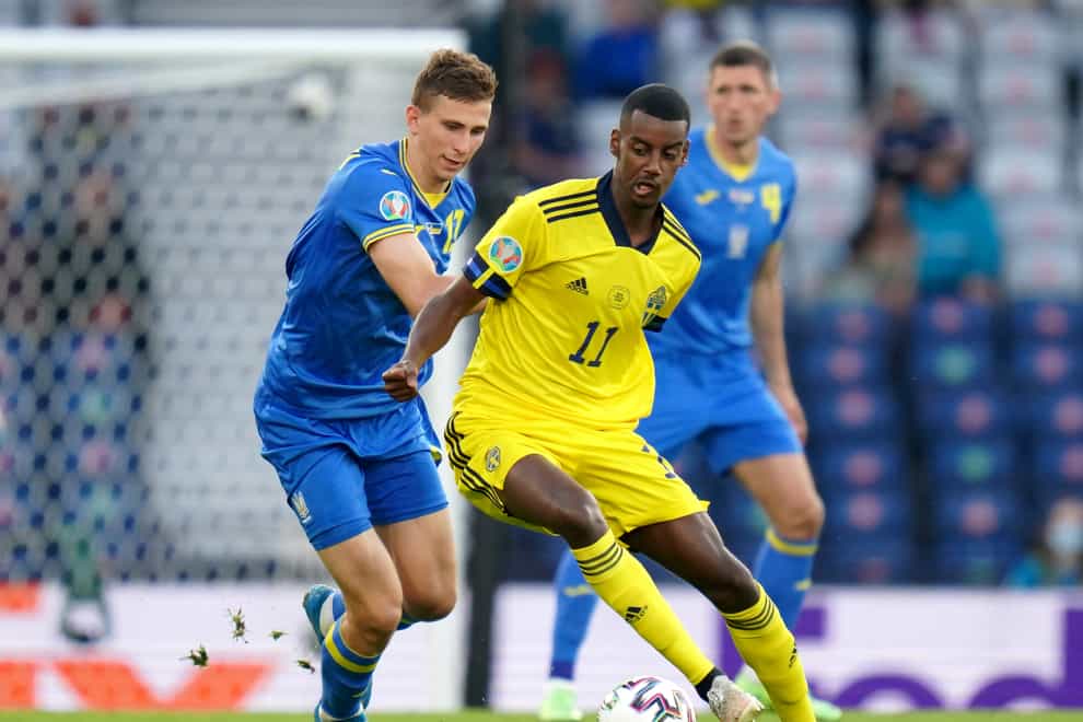 Alexander Isak, centre, travelled to England on Thursday to finalise his move (Jane Barlow/PA)