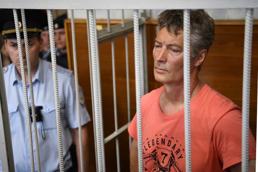 Yekaterinburg ex-mayor Yevgeny Roizman stands in a cage at a court room during a hearing in Yekaterinburg, Russia, on Thursday, August 25, 2022 (AP/PA)