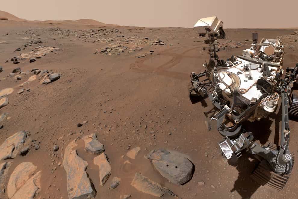 The Perseverance Mars rover takes a selfie as it looks at the “Rochette” rock, the first rock successfully sampled by the rover (NASA/JPL-Caltech/MSSS)