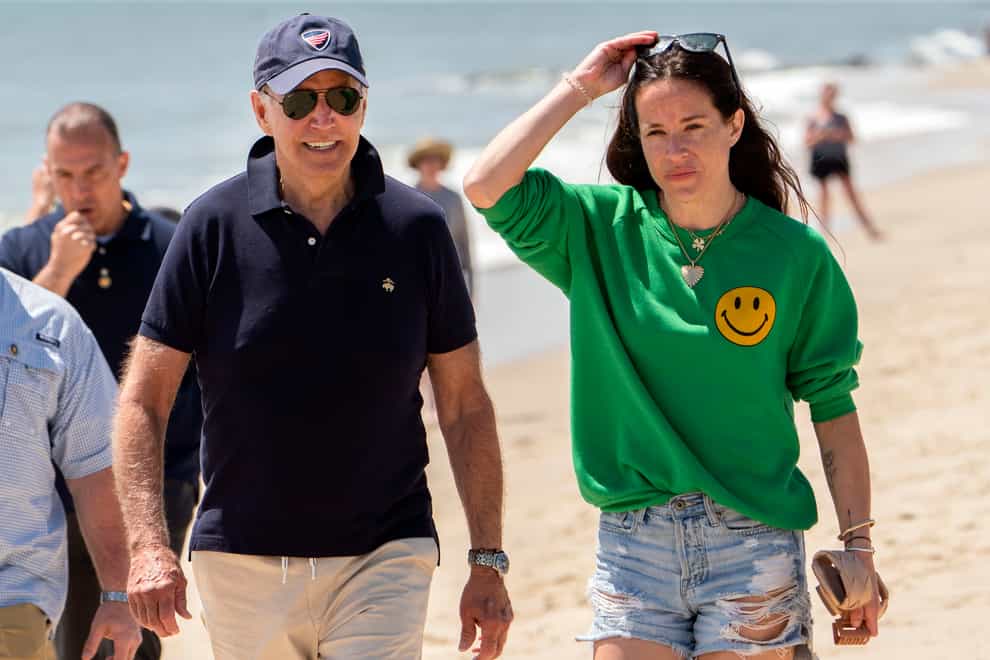 President Joe Biden walks on the beach with daughter Ashley (Manuel Balce Ceneta/AP/PA)