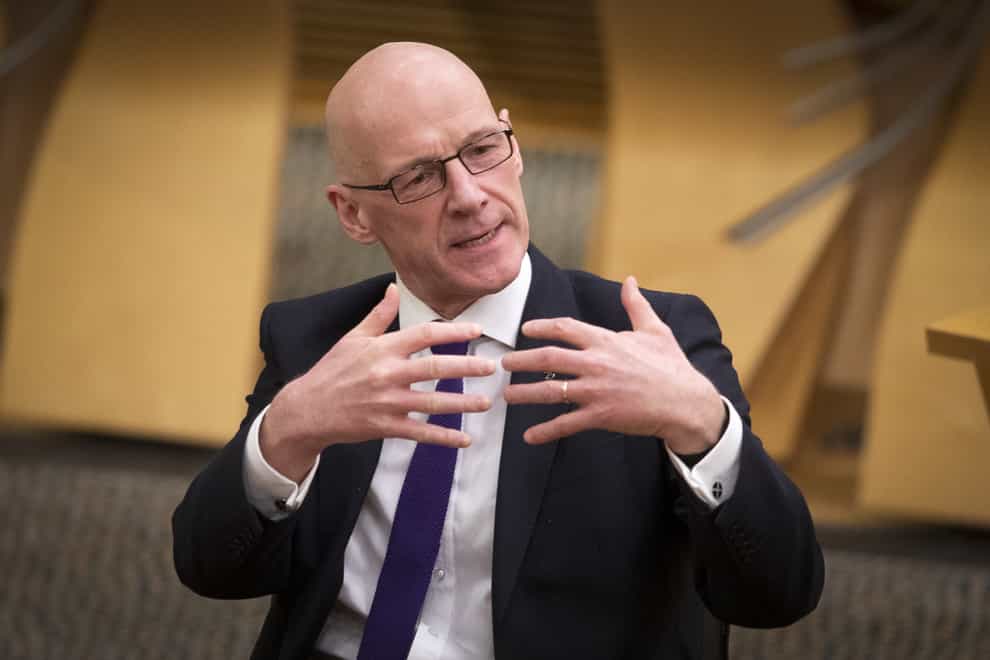John Swinney said he ‘welcomes’ the commitment to reaching a fair pay deal in the ongoing council pay row (Jane Barlow/PA)