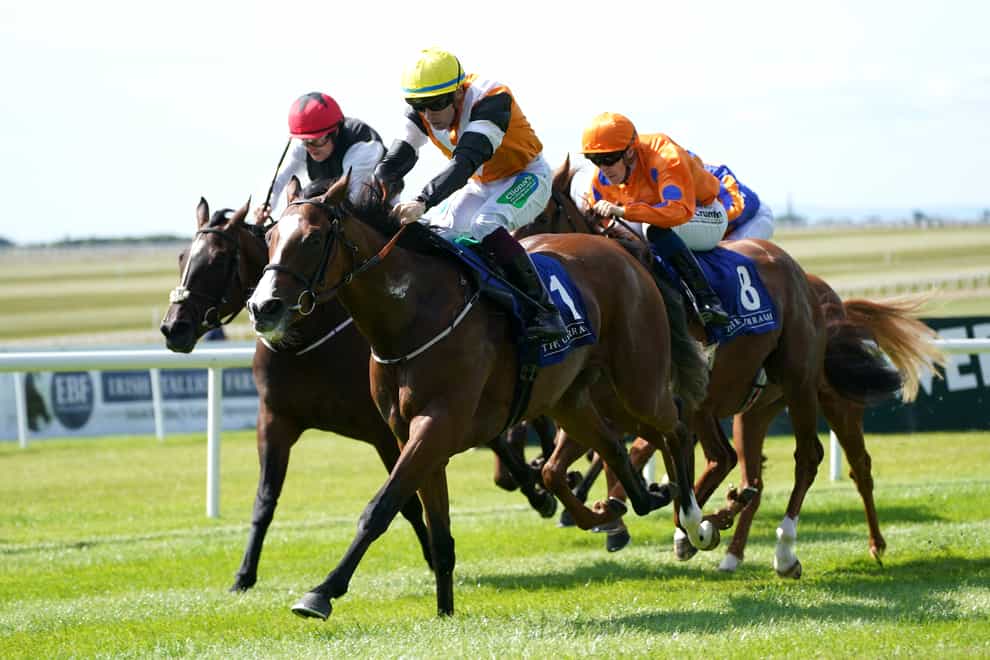 Aspen Grove (centre) on her way to victory (Brian Lawless/PA)