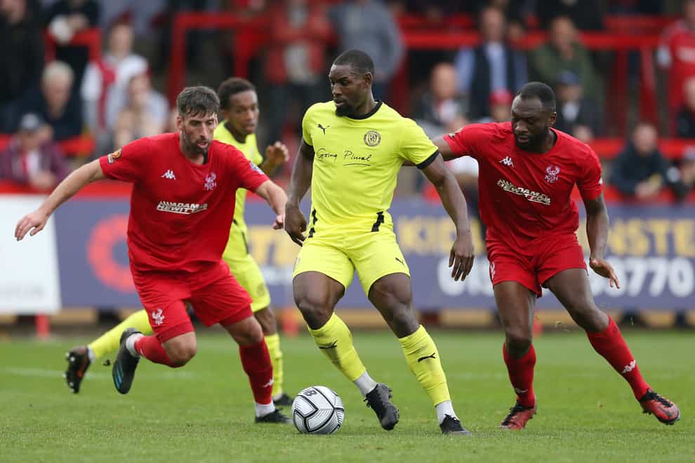 Lee Ndlovu, centre, rescued a point for Boreham Wood (Barrington Coombs/PA)