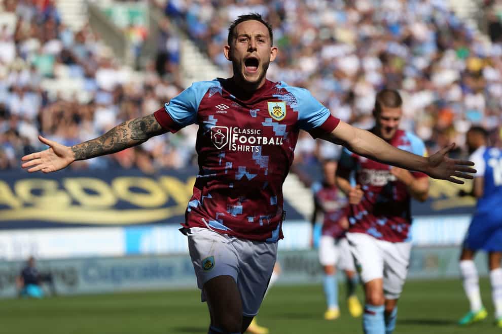 Burnley’s Josh Brownhill celebrates the second of his two goals against Wigan (Barrington Coombs/PA)