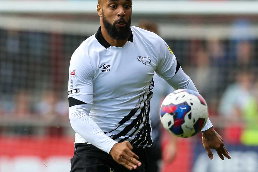 David McGoldrick netted a stoppage-time winner for Derby against 10-man Peterborough (Barrington Coombs/PA)