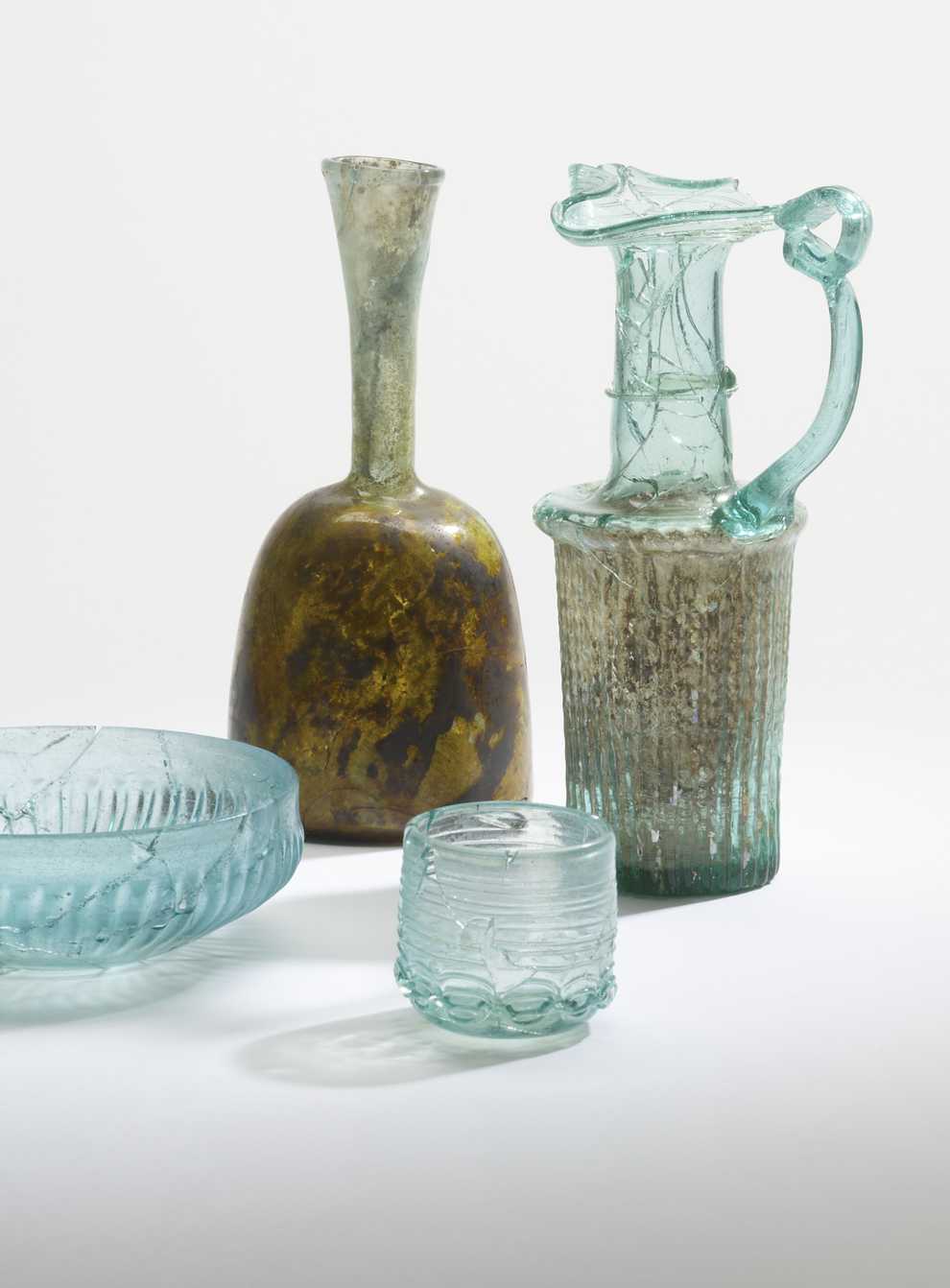 A Roman bowl, AD 50-70, Early Islamic flask, AD 700-1000, Byzantine cup, AD 500-700, Byzantine jug, AD 400-500 (British Museum)