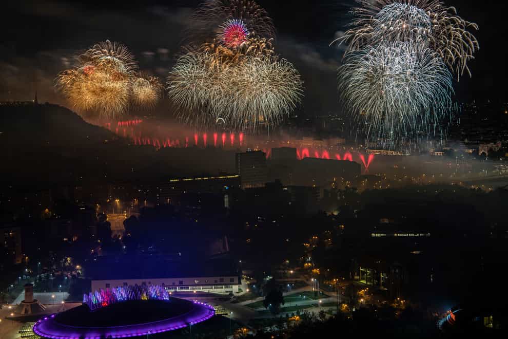 Fireworks explode above the River Danube (Szilard Koszticsak/MTI/AP)