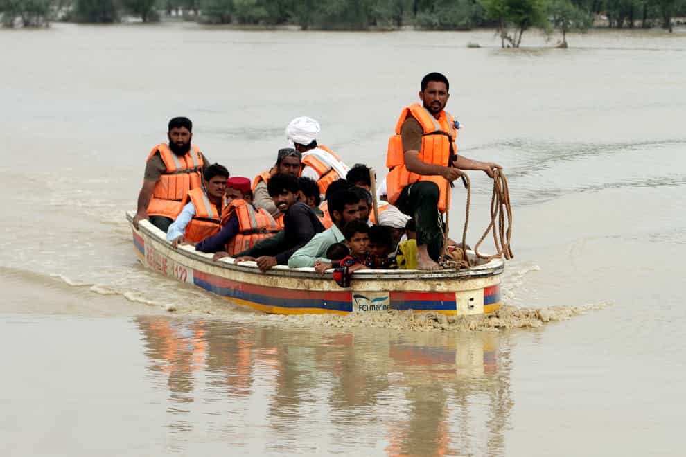 Almost 1,000 people have been killed and thousands more injured by flash floods triggered by heavy monsoon rains across much of Pakistan since mid-June (Asim Tanveer/AP)