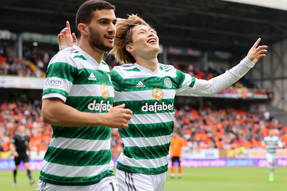 Celtic’s Kyogo Furuhashi (right) and Liel Abada scored a hat-trick apiece in a fine win at Dundee United. (Steve Welsh/PA)