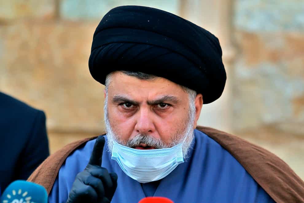 Influential Iraqi cleric Muqtada al-Sadr has announced his retirement from politics (Anmar Khalil/AP)