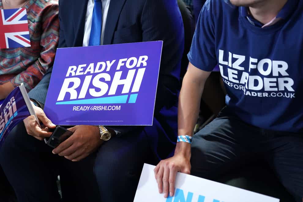 Rishi Sunak and Liz Truss supporters at a hustings event (PA)