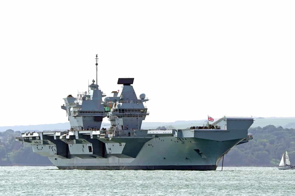 Aircraft carrier HMS Prince of Wales sits off the coast of Gosport, Hampshire, after it suffered a propeller shaft malfunction. The GBP 3 billion warship left Portsmouth Naval Base on Saturday before an “emerging mechanical issue” occurred off the south-east coast of the Isle of Wight. Picture date: Tuesday August 30, 2022. (Gareth Fuller/PA Wire)