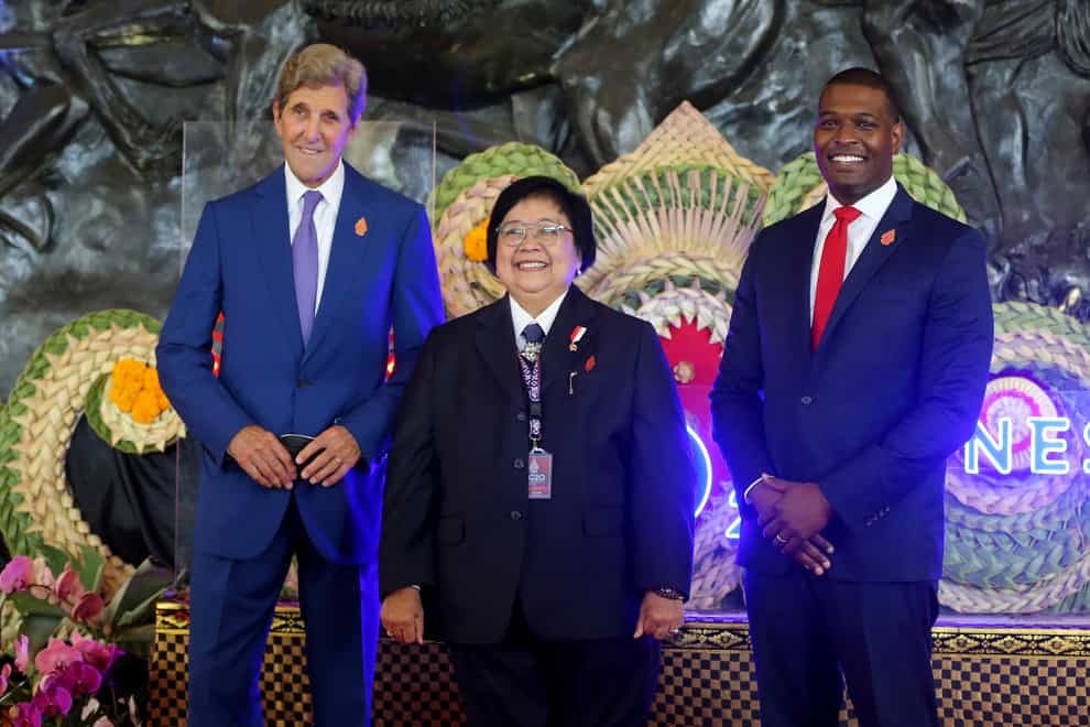 Special presidential envoy for climate John Kerry, Indonesian environment minister Siti Nurbaya Bakar and US environmental protection Agency Administrator Michael Regan (AP)