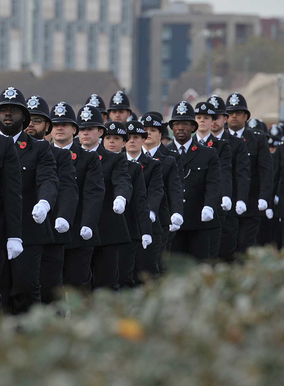 Metropolitan Police recruits marching during a passing out parade (PA)
