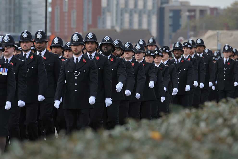 Metropolitan Police recruits marching during a passing out parade (PA)