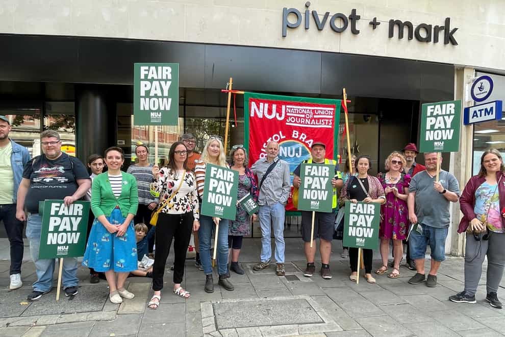 Staff and supporters outside the Bristol Post’s co-working space (Tess de la Mare/PA))