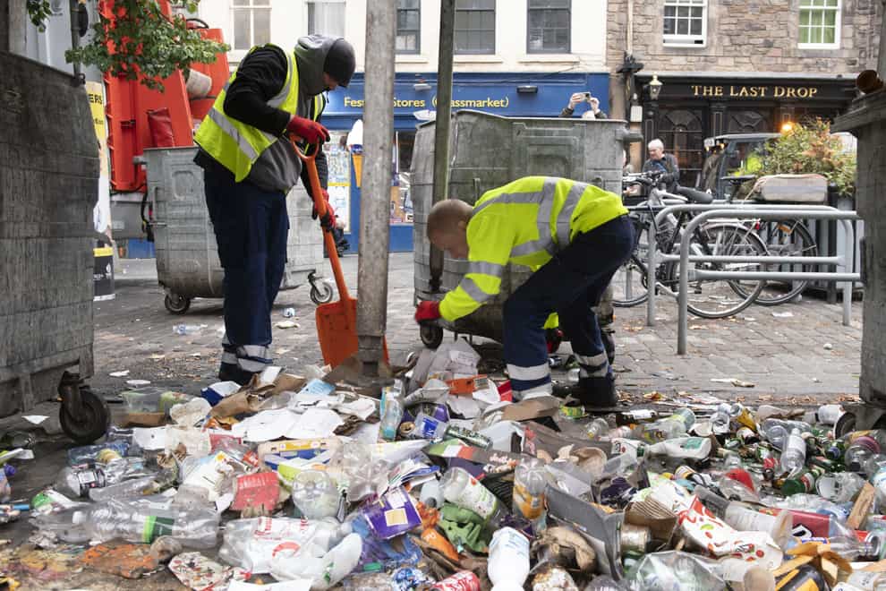 Clean-up operations have begun as waste staff across Scotland return to work (Lesley Martin/PA)